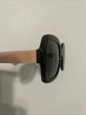 Gucci Black Frame Sunglasses with Pink Temples and Gold Logo